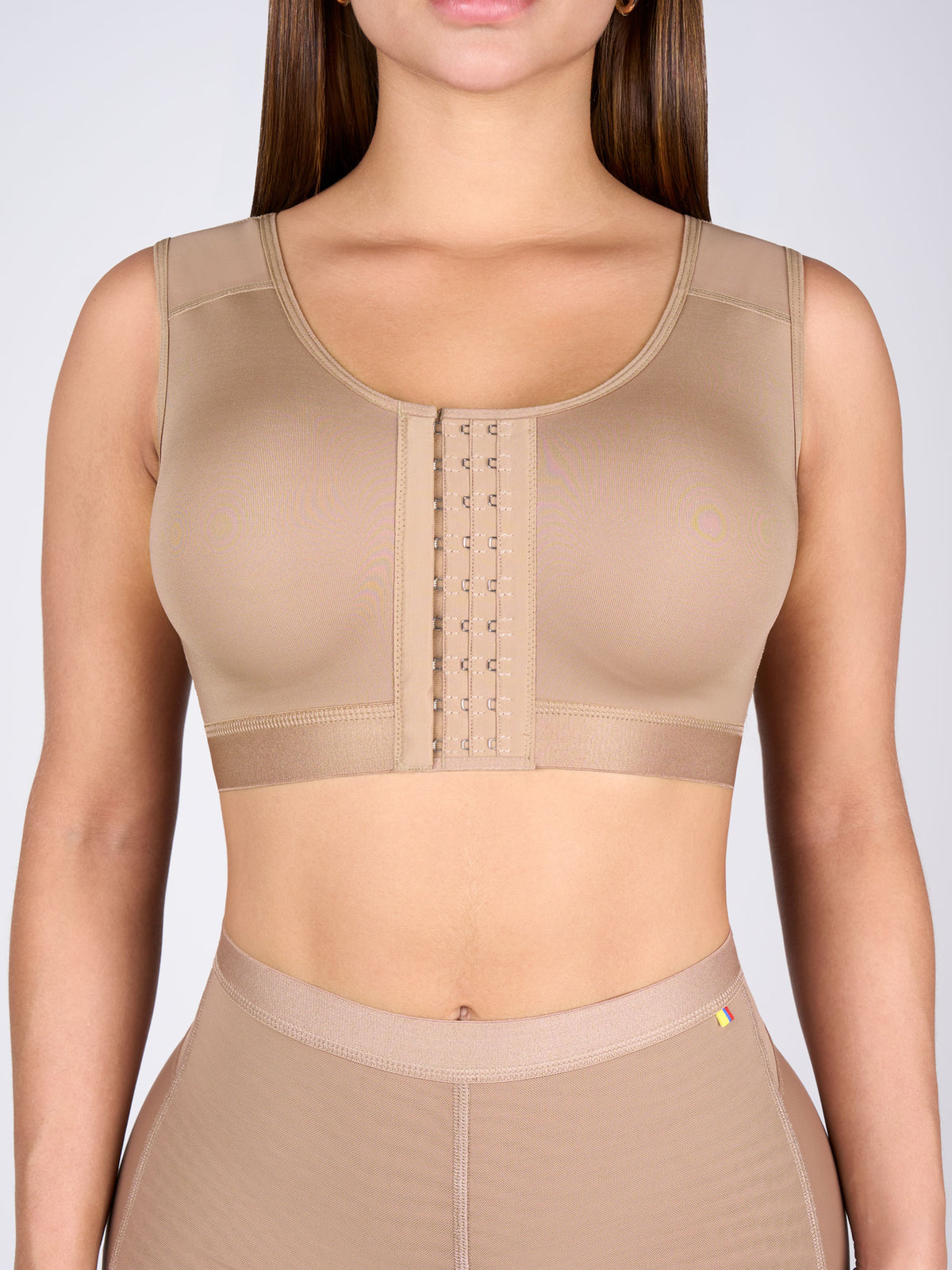 Woman wearing the mocha Bra for Large Bust with multi-row front hooks that provide firm support and a secure fit #color_Mocha