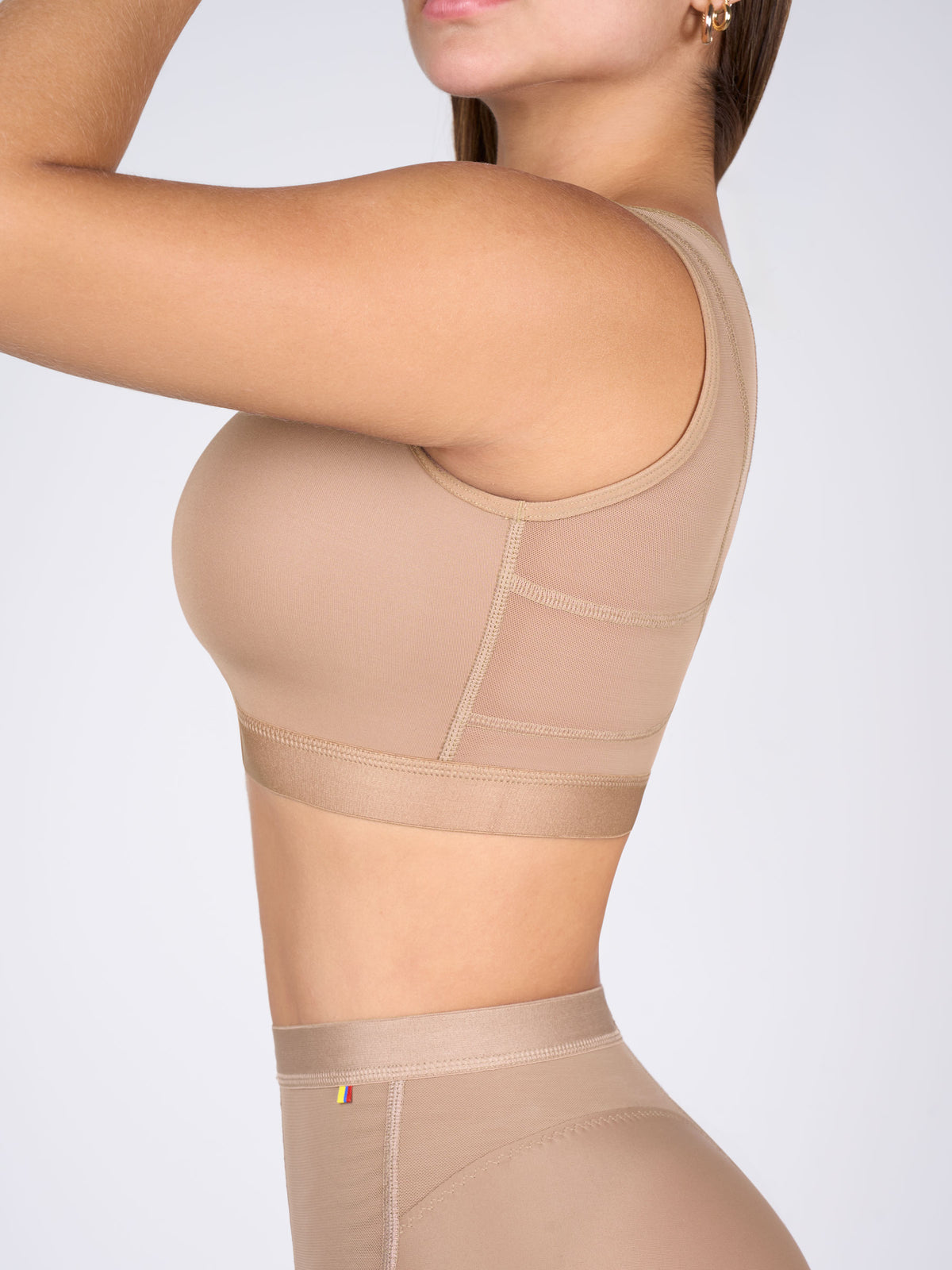 Side view of the mocha Bra for Large Bust supporting the bust, with a mesh side panel and a wide elastic underband #color_Mocha