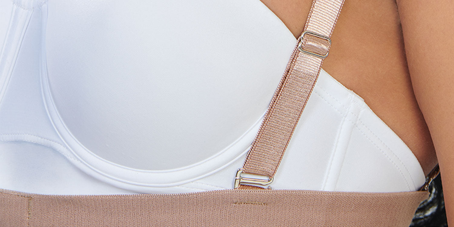 Detalle de las tiras removibles y ajustables de la faja colombiana Full Body strapless color moca, que ofrecen soporte adicional y libertad de uso.